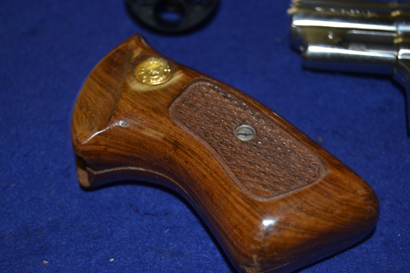 Taurus International Mfg. Co. Model M85 .38 Special Speed Load, Wood