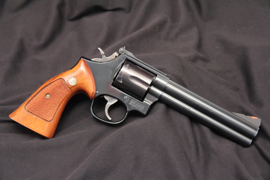 Image result for a Smith and Wesson 586 Distinguished Combat in caliber .357 Magnum!